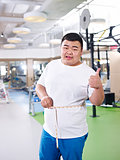 overweight man  in gym