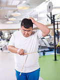 overweight man in gym