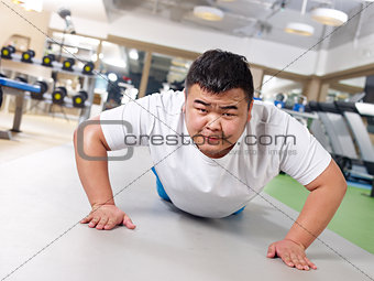 overweight man exercising