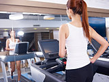 young woman on treadmill
