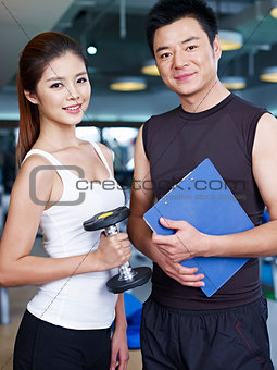 man and woman in gym