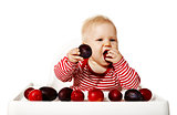 Baby Eating Plums