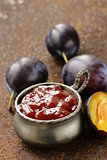 natural organic plum jam with fresh berries