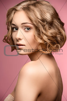 curly woman with bob hair-cut 