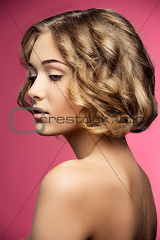 woman with curly stylish hair-cut 