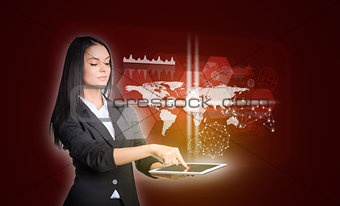 Women using digital tablet and world map with hexagons