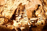 Beautiful cave with many stalagmites and stalactites inside