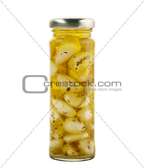 Glass Jar Of Garlic With Olive Oil