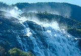 Summer Langfossen waterfall  (Norway).