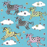 Cute background with cartoon unicorns in the clouds