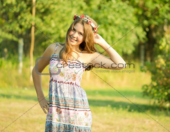 Outdoor portrait of the girl of 14 years old.
