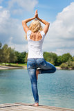 Blond woman yoga exercise
