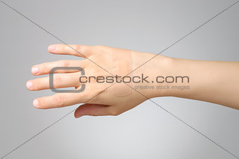 Plaster on female hand