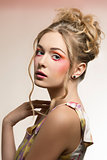 female with stylish colorful make-up