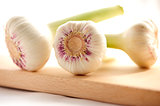 Garlic on a wooden cutting board