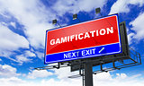 Gamification Inscription on Red Billboard.