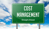 Cost Management on Highway Signpost.