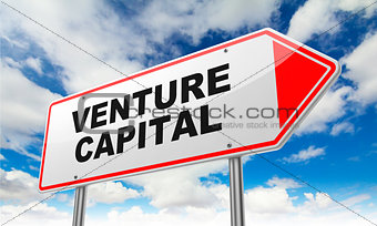 Venture Capital on Red Road Sign.