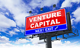 Venture Capital Inscription on Red Billboard.