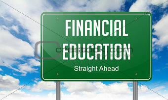 Financial Education on Highway Signpost.