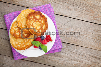 Pancakes with raspberry, blueberry and mint