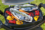Fresh dorado fish and bell pepper grill cooking