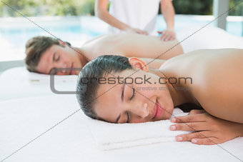 Couple enjoying massage at health farm