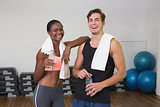 Personal trainer and client chatting