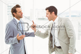 Business colleagues in argument at office