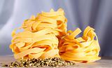Tagliatelle and herbs in a kitchen
