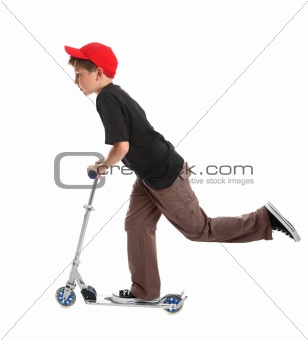 Child riding a scooter toy
