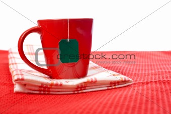 Red cup with tea-bag