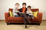 Mother And Two Sons Reading A Book 4