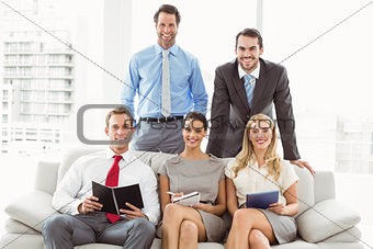 Portrait of young business people in office