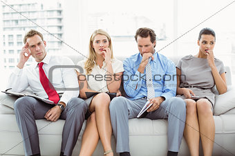 Nervous executives waiting for interview
