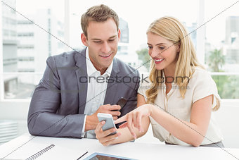 Business people using mobile phone