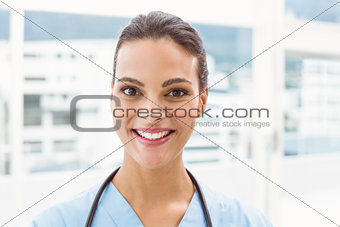 Close up portrait of a smiling confident female doctor