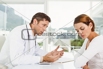 Doctor in discussion with patient in medical office