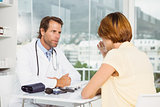 Doctor in discussion with patient at medical office