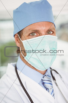 Close up portrait of doctor wearing surgical mask