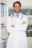 Confident male doctor in medical office