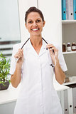 Female doctor with stethoscope at medical office