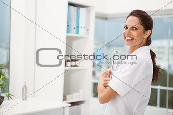 Female doctor with digital tablet in medical office