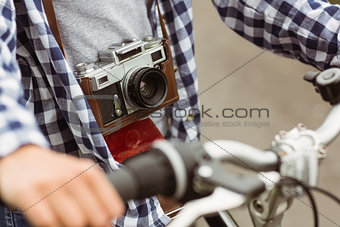 Close up of the bike and a retro camera