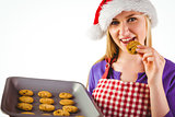 Festive blonde showing hot cookies
