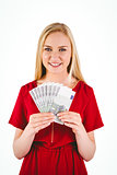 Pretty blonde in red dress showing her cash