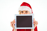 Festive blonde holding a tablet pc