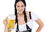Pretty oktoberfest girl holding beer tankard