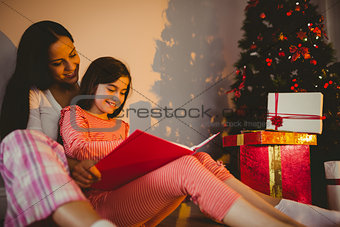 Mother and daughter waiting for santa claus