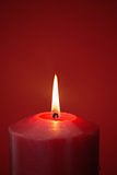 Red candle burning brightly
